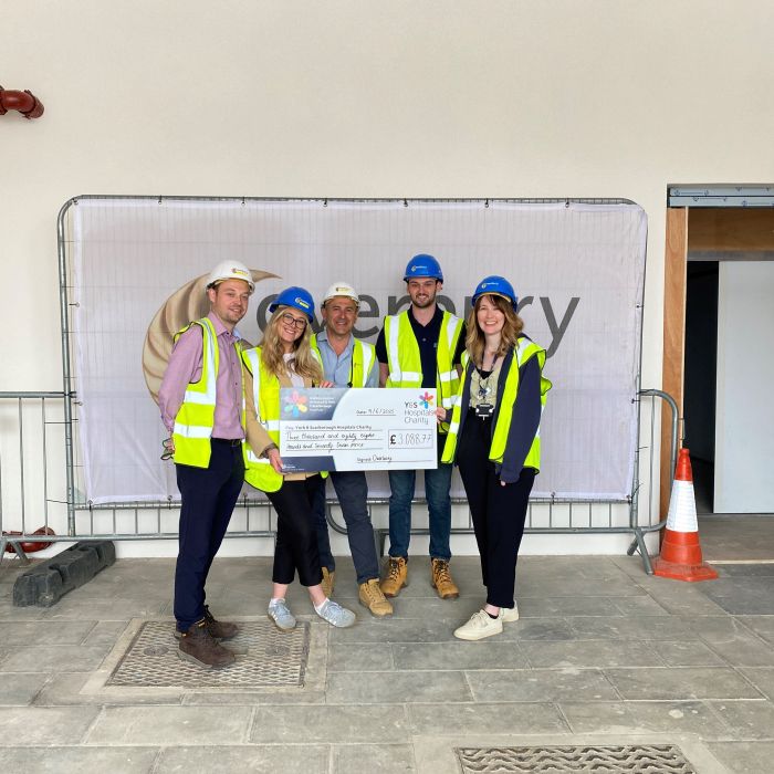 Overbury team wearing hi-vis jackets and hard hats