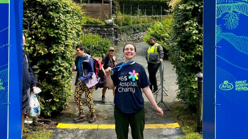 Rebecca Bradley celebrating with her medal