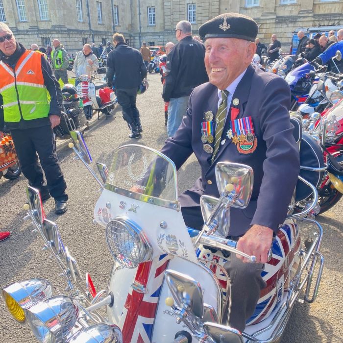 Veteran Ken Cooke on a vintage scooter